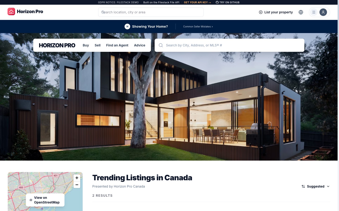 A listings marketplace home page, with a search bar over a listing photo and a property grid below it.